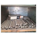 Shelf of black/ galvanized pipe fittings