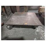 1 metal floor dolly with wheels