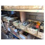 Contents shelves industrial rigging hardware, wire rope clips, steel eye grab hooks