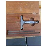 lot contains  a Starrett No. 445 depth micrometer, a precision machinist's tool used for accurately measuring the depth of slots, steps, and recesses.