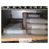 Shelf of black/ galvanized pipe fittings
