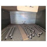 Shelf of black/ galvanized pipe fittings