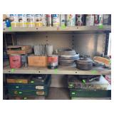 Contents of shelf misc tools hubs coupling cover.