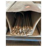 Partial box of assorted welding rod.