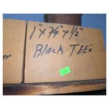 Shelf of black/ galvanized pipe fittings