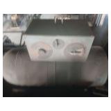 industrial control panel, possibly for a welding machine, featuring dials for controlling current or voltage settings.