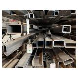 16 pieces of various large rectangular and square tubing ranging from 2’ to 20’