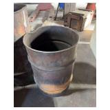 1 medium sized metal barrel with no handles