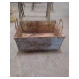 vintage metal storage container, commonly referred to as an industrial bin or a classic metal toolbox.
