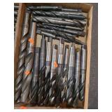 1 lot containing various sized tapper shank carbon steel drill bits.