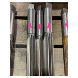 Three large reaming bits