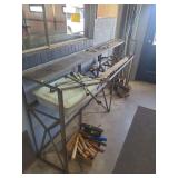 lot contains a 18 by 96 inch metal shelf. contents on shelf not included