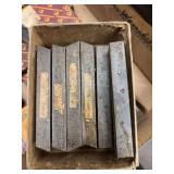 Box of tool bits for a metal lathe