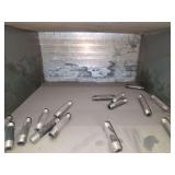 Shelf of black/ galvanized pipe fittings