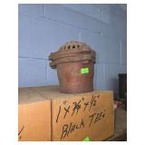 Shelf of black/ galvanized pipe fittings