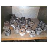 Shelf of galvanized/black pipe fittings