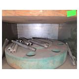 Shelf of black/ galvanized pipe fittings