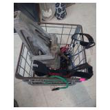 lot contains  a metal caged box with 5 aluminum RV stabilizer Jack's, 5 adjustable scree Jack's and various pieces of chain, clips and bungee cords.