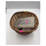 Basket with toy train parts