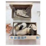 2 boxes of vintage baby shoes