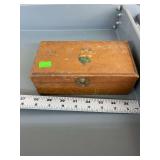 Wooden box with flower art on lid.