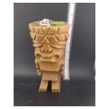 lot contains a  hand carved tiki statue.