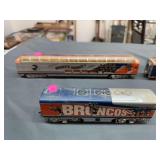 Denver Broncos train cars, including one engine. HO scale