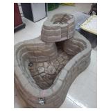 lot contains a small hard plastic 2 level pond for fish or turtles.