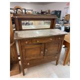 Mirrored wooden buffet cabinet with glass