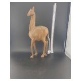 lot contains a decorative hand-carved wooden animal figurine, typically classified as a collectible.
