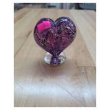 Glass purple heart decor.