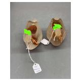 Two swan glass candle holders.