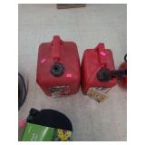 lot contains a  2gal and a 1gal plastic gasoline jugs