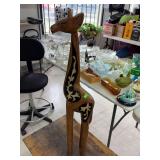 Wooden giraffe statue