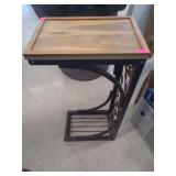 lot contains a small side table