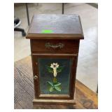 Small Wooden jewelry box. Glass front.