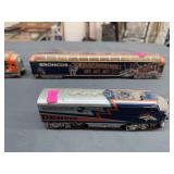 Denver Broncos train cars, including one engine. HO scale