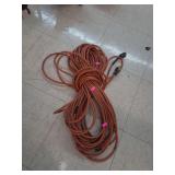lot contains a 100ft orange extension cord.