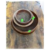 4 wooden bowls.