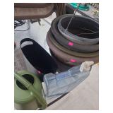 lot contains a watering jug, plastic water container, trash can,7 flower pots.