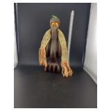 lot contains a hand carved decorative wooden figurine.