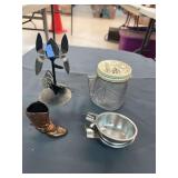 Metal carafe, small sifter, cookie cutters and a mini boot