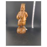 lot contains a  vintage hand-carved wooden figurine of an elderly Asian man, often referred to in listings as an Asian 'wise man,' 'scholar,' or 'immortal' figure.