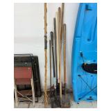 Assorted rakes, scraper, long-handled spade and 8’ pruner
