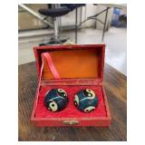 Blue yin yang stress balls. In red box.