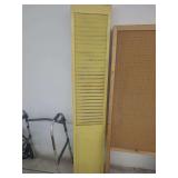 lot contains 3 vintage, shabby-style, yellow-painted wooden interior louvered bi-fold shutters.