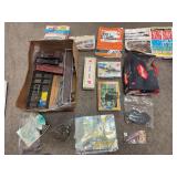 Assorted scale, train, modeling items, track plans, plan, books, scale, building, a scale, crossings, decals, trees, organizing bins, real grease, lubricant, stale tanks, rocks, etc. ￼