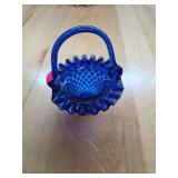 Blue glass basket decor.