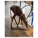 Wooden impala statue.