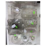 Glass trays, candles holders and 3 butter dishes.